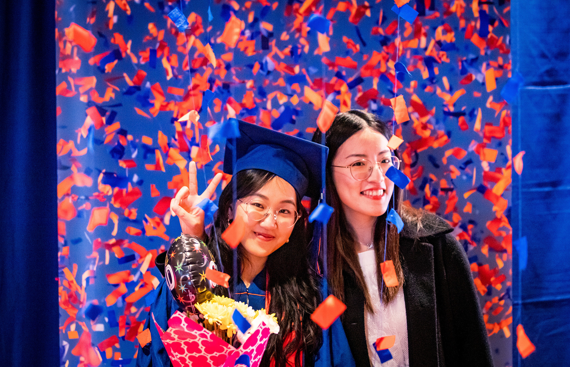 students in graduation regalia.