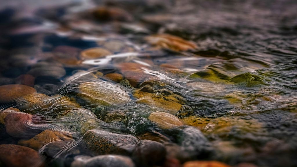 water over pebbles.