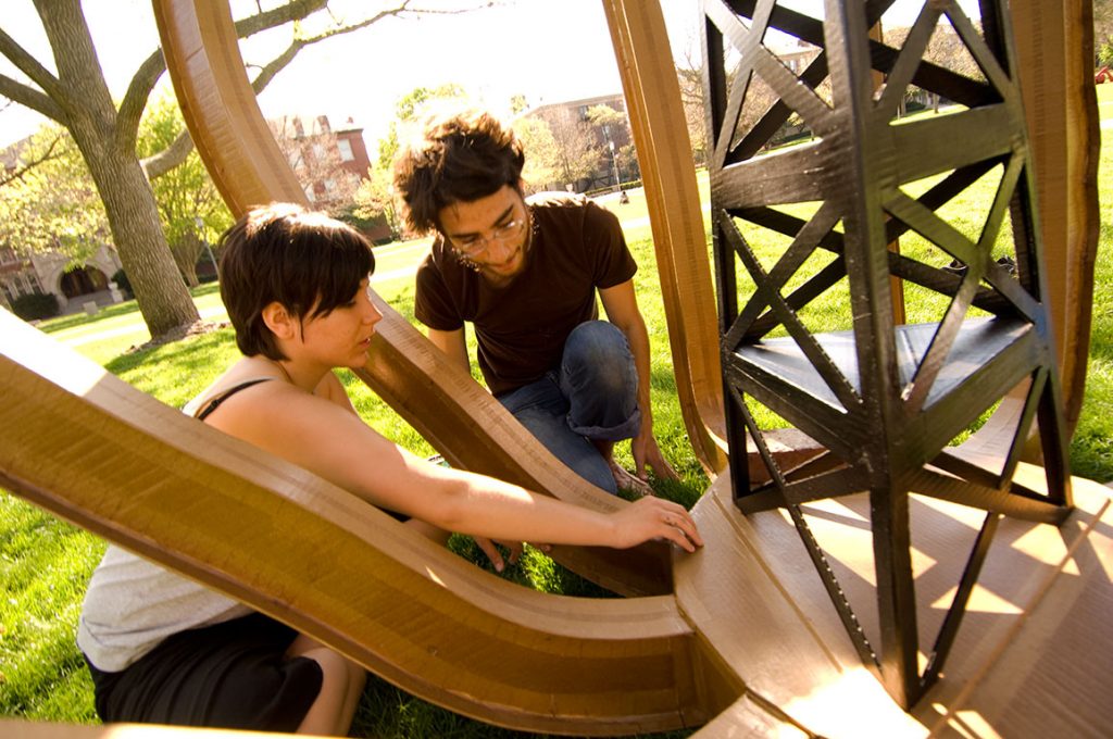 two students constructing a sculpture on the Main Quad for Art for Public Places course at the University of Illinois at Urbana-Champaign