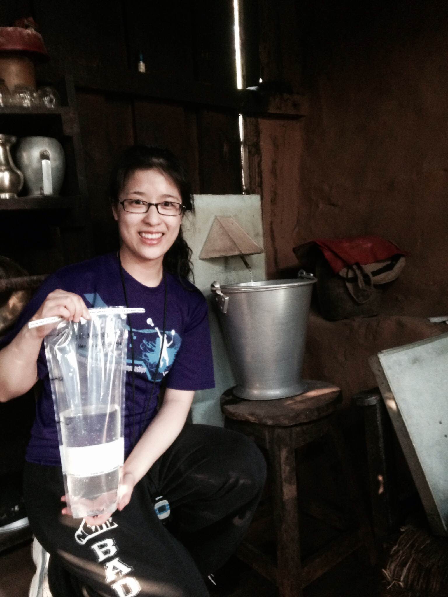 Hanting with the clear effluent sample from a BSF in Jhapa, Nepal