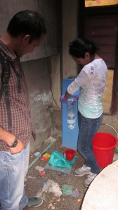 Ofelia is taking water samples at a school in Kathmandu