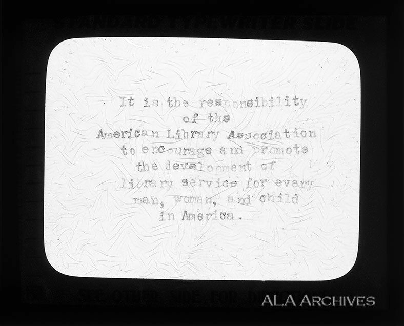 Glass plate slide reads "It is the responsibility of the American Library Association to encourage and promote the development of library services for every man, woman, and child in America."