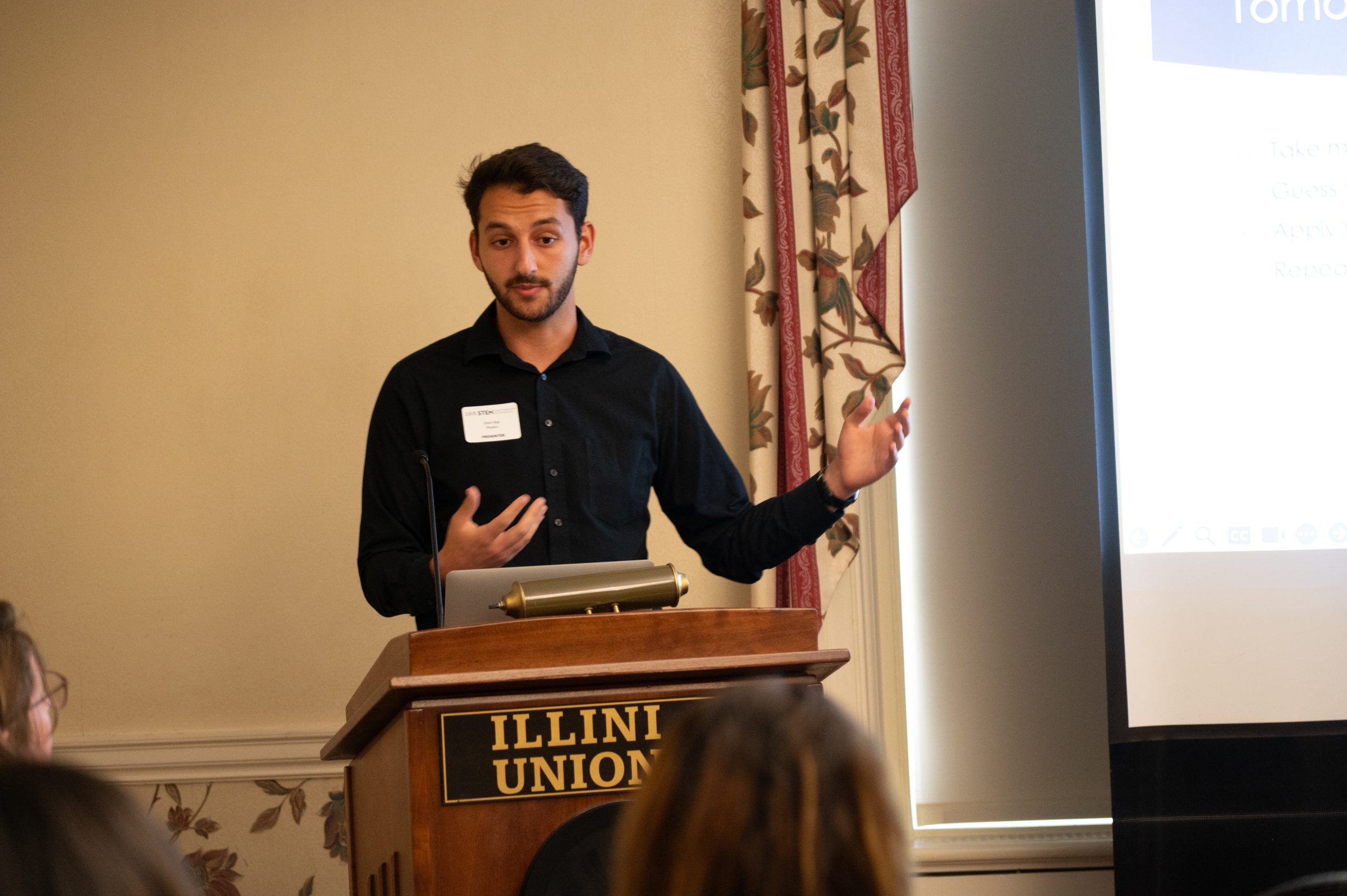 Student presenting research at the 2023 STEM Career Exploration and Symposium