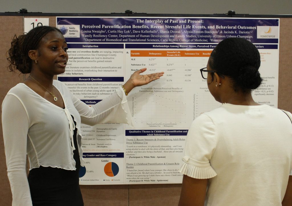 Student with research poster