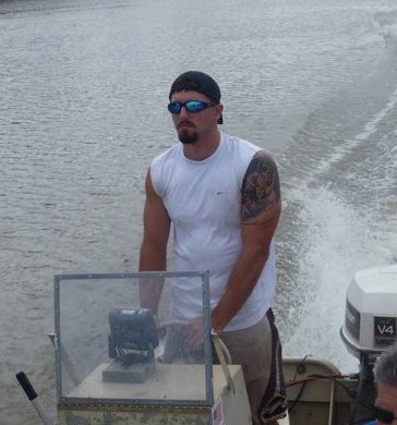 Man piloting boat
