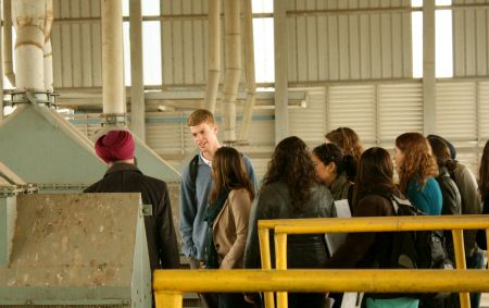 On a facility tour, staff showed students how quality control, logistics, inventory management, and other functions operate at Adani. Credit: ADM Institute/Kari Wozniak