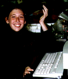 Jamie Bender sits at a computer