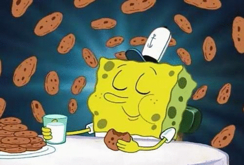A gif of Spongebob enjoying cookies and milk