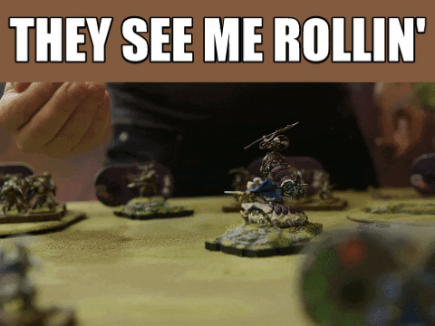 Hand rolling dice, text "They see me rollin'"
