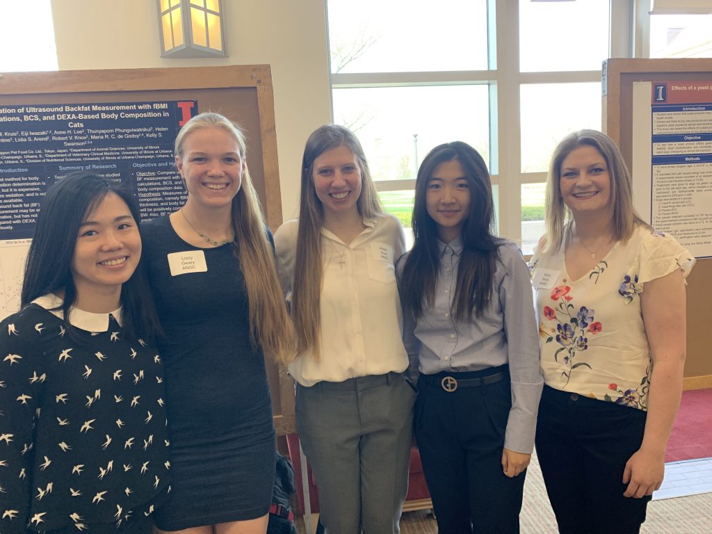 Ching-Yen Lin, Elizabeth (Lizzy) Geary, Alissa Kruis, Xiaojing (Teresa) Yang, and Kelly Sieja at the Undergraduate Research Symposium at UIUC. Spring 2019
