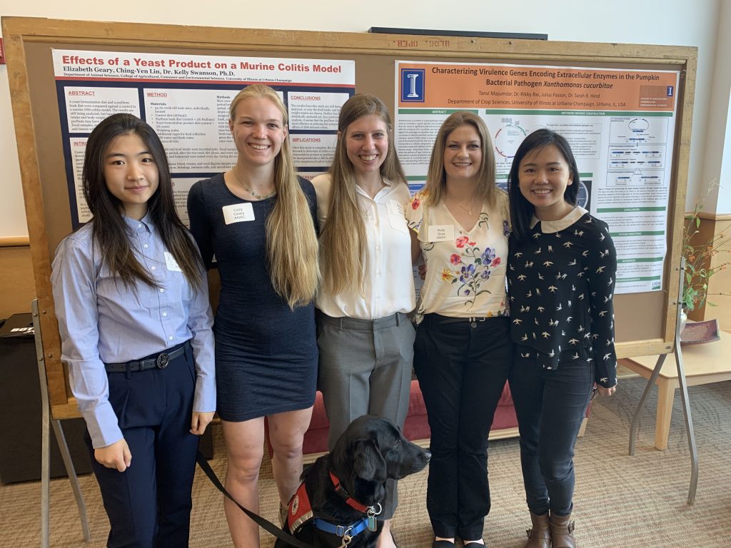 Xiaojing (Teresa) Yang, Elizabeth (Lizzy) Geary, Alissa Kruis, Kelly Sieja, and Ching-Yen Lin at the Undergraduate Research Symposium at UIUC. Spring 2019