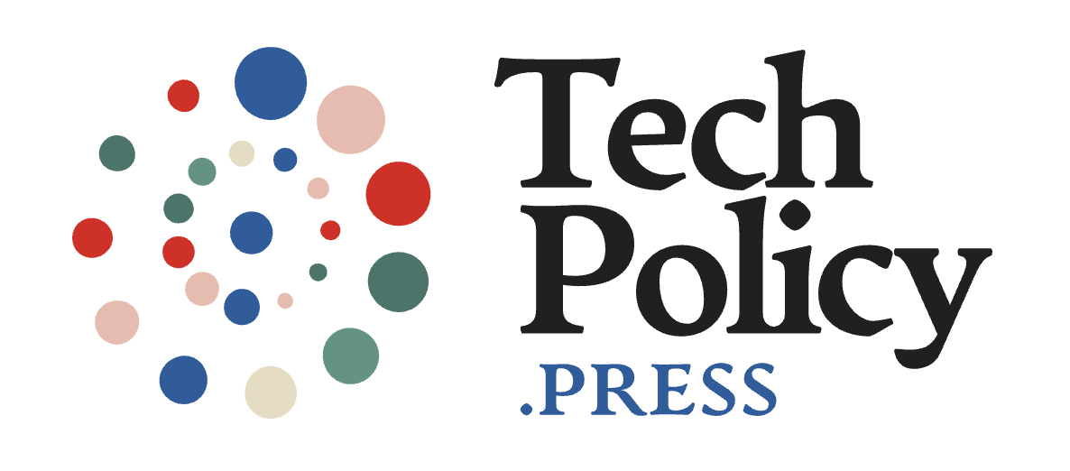 Tech Policy Press logo with colorful, overlapping circles of various sizes on the left and the words Tech Policy .PRESS in bold black and blue font on the right. (alt text generated by alttext.ai)