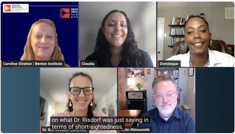 A virtual meeting with five participants, four women and one man, all smiling. Name labels identify Caroline Stratton, Claudia, Dominique, Dr. B. Risendorf, and Colin Rhinesmith. Captions appear at the bottom of the screen. (alt text by alttext.ai)