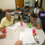 Denise participates with teachers in the Radioactive Decay Activity (A Lesson with Dice).