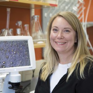Rebecca Klaper in a brightly colored laboratory at the University of Wisconsin.