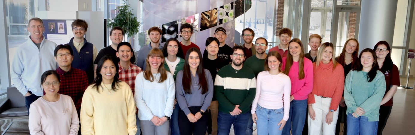 Front row, l-r: Dr. Hyang Yeon Lee, Rachel Schaaf, Brett Cain, Suja Thakali, Dr. Jenny Van Natta, Luis Munoz, Jonathan Maturano. Middle row, l-r: Michael Mulligan, Dr. Myung Ryul Lee, Kyle Abo, Diego Lopez, Amanda Smith, Brooke Bowens, Emily Nash, Morgan Gugger, Rowan Glover. Back row, l-r: Kameron Wildeman, Thomas Trzupek, Dr. Zachary Liveris, Dr. Jonny Quirke, Dr. Matteo Martinelli, Blake Levy, Jeffrey Chance, Vinny Pillai, Prof. Paul Hergenrother