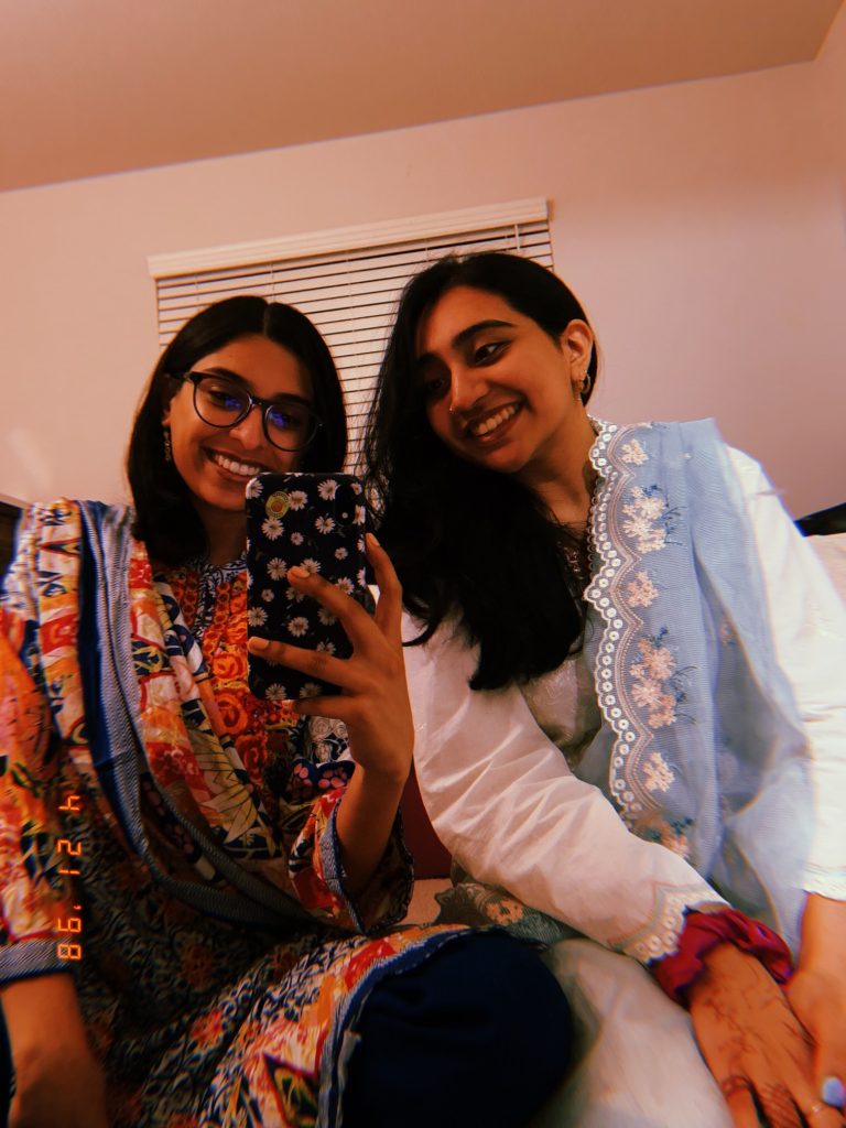 Wardah (right) and her cousin (left) wearing traditional shalwar kameez.