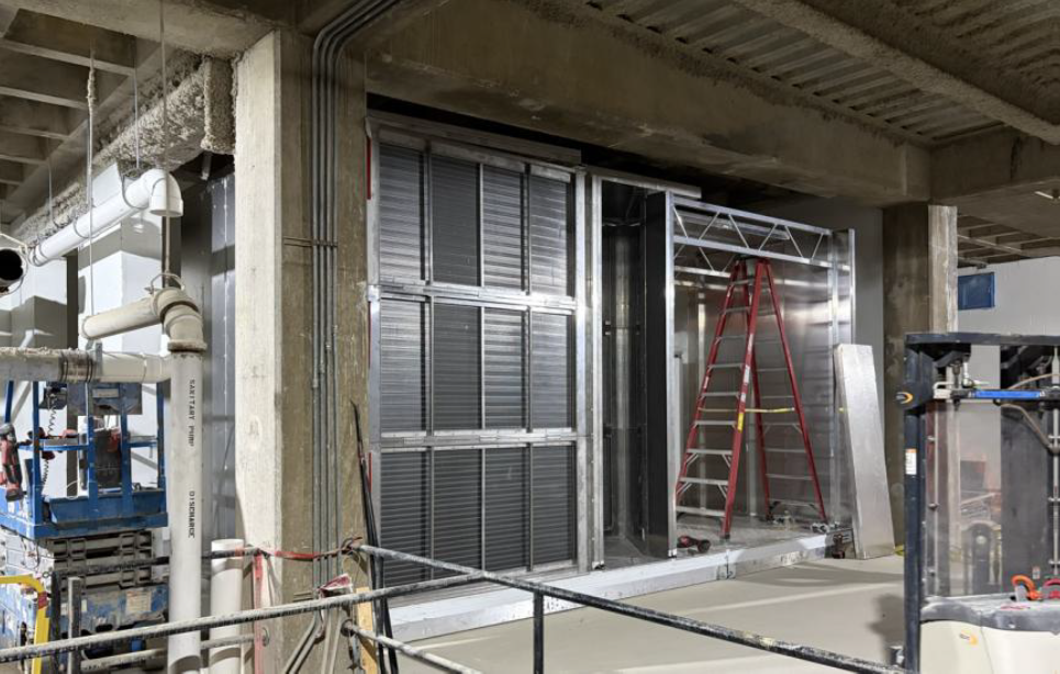AHU being installed at lower level north mechanical room.