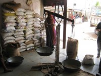 <span style="font-size: 11px;font: Arial;color: #999999">Premises of a local trader who purchases grain from farmers. <em>Credits: ADM Institute/MART.</em></span>