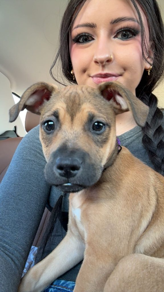 Selfie of me and my puppy (black mouth curr) in a car